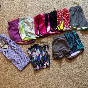 Lot of Under Armour & Nike Girls shorts, shirts and tanks